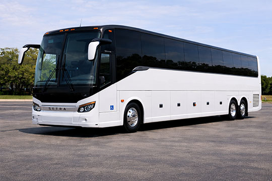 56-passenger charter bus rental Laramie TX